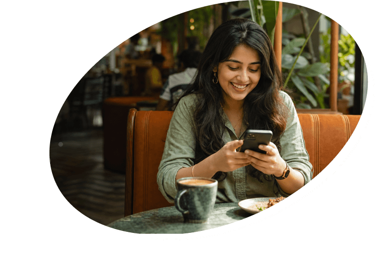 Reglrs Five Levers visual featuring a guest using her phone in a cafe.